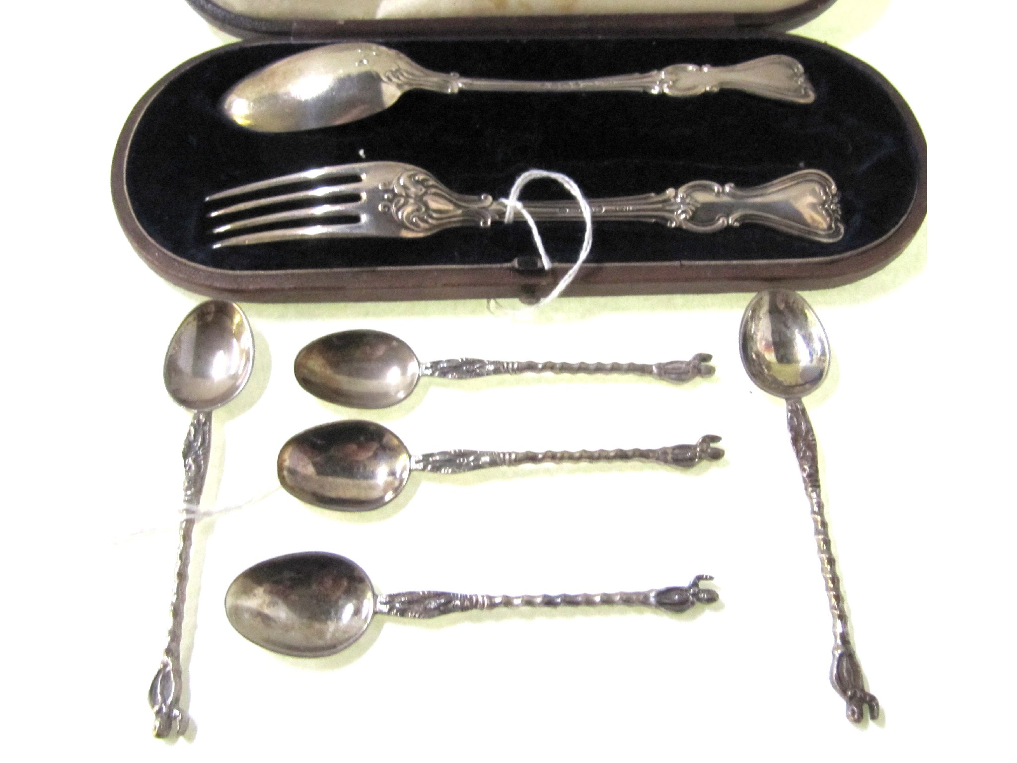 Appraisal: A lot comprising a cased part silver christening set and