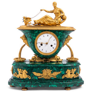 Appraisal: An Empire Gilt Bronze Mounted and Malachite Veneered Figural Mantel