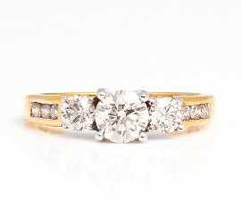 Appraisal: An ct gold three stone round brilliant cut diamond set