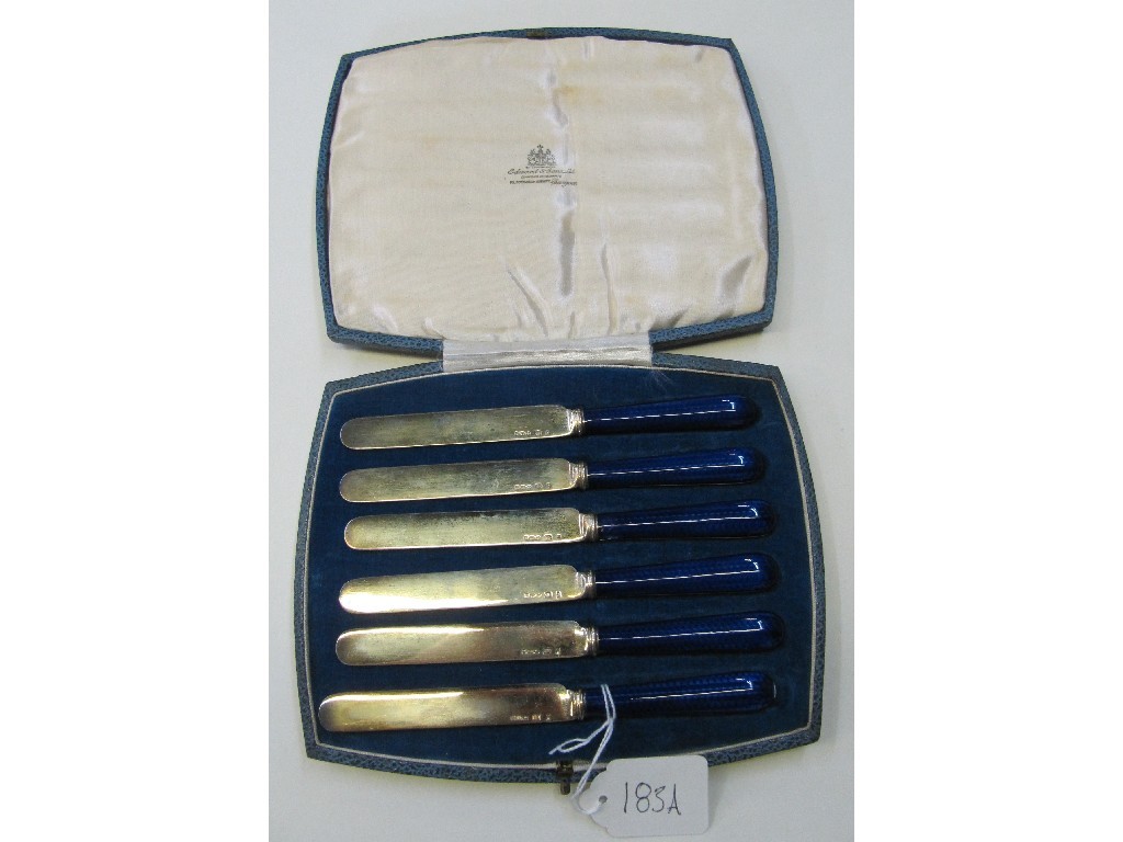 Appraisal: Cased set of continental silver and blue enamel handled butter