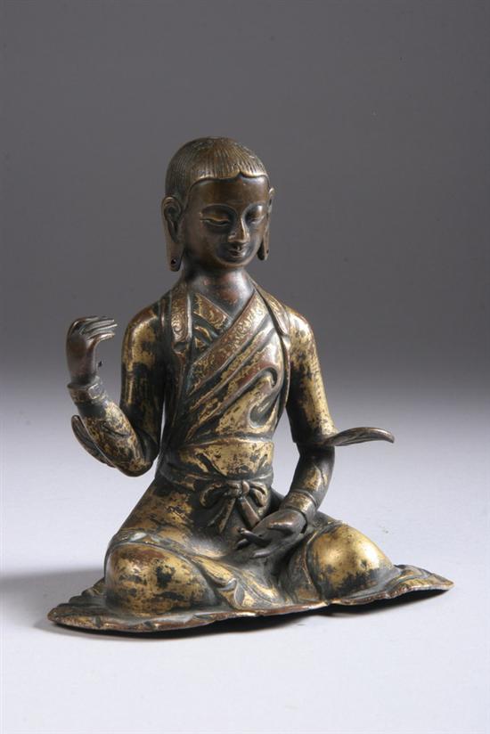 Appraisal: SINO-TIBETAN GILT BRONZE FIGURE OF MONK th century Two robes