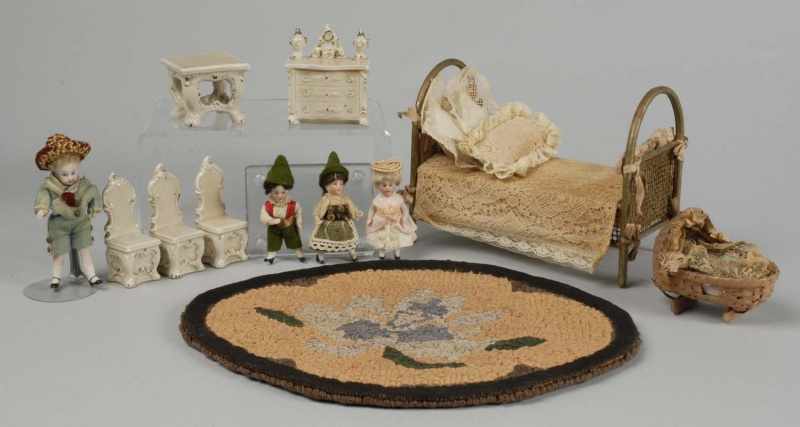 Appraisal: Lot of Miniature Dolls and Furniture Description German bisque dolls