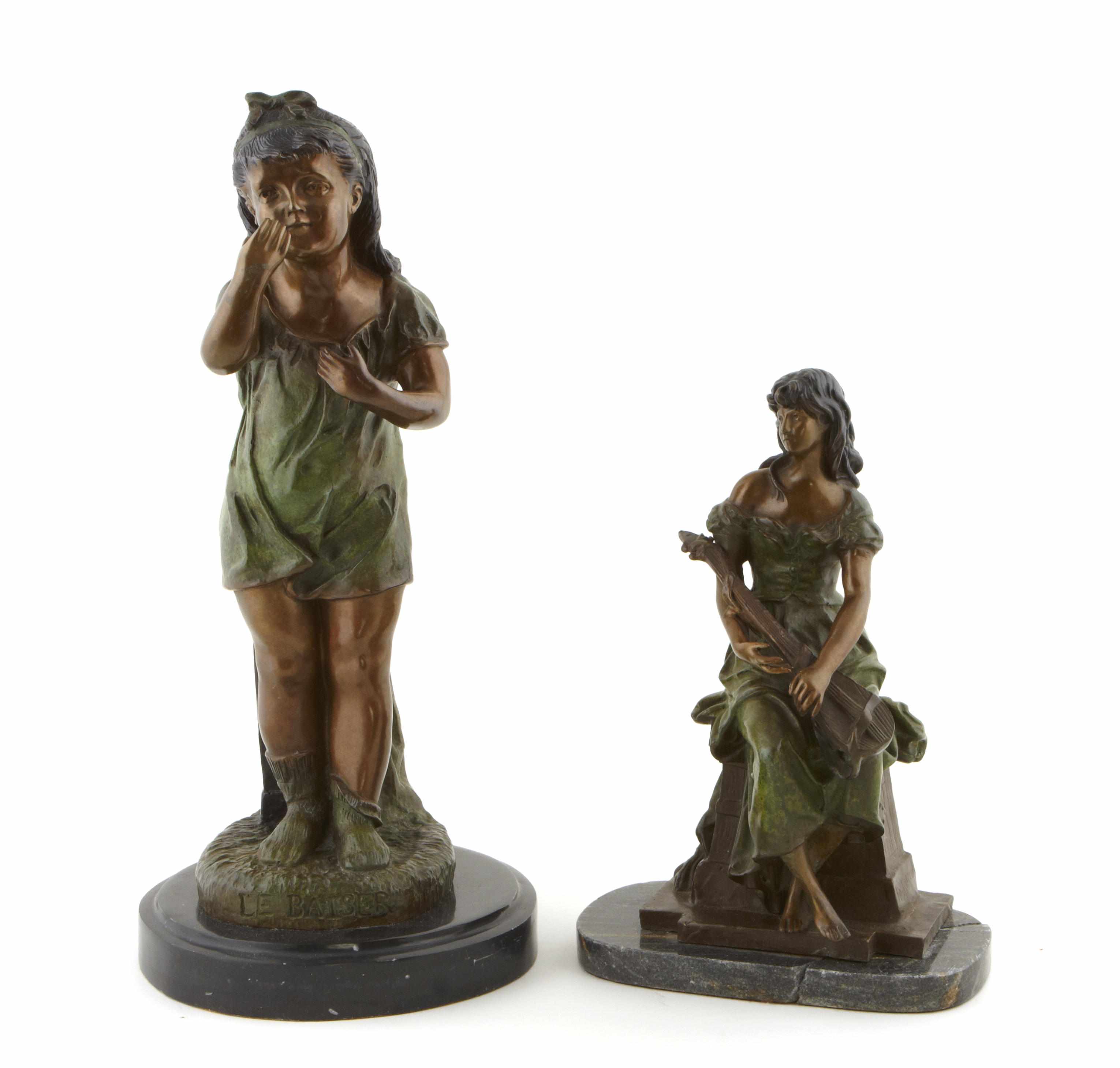 Appraisal: A group of two bronze figures of girls One seated