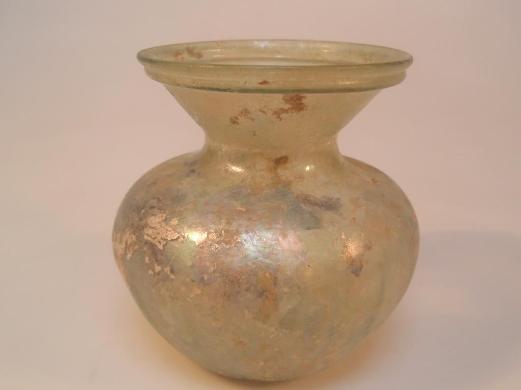 Appraisal: A large Roman pale greenish glass jar the wide flaring