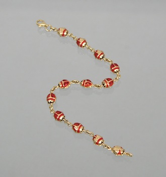 Appraisal: A Dainty Gold Ladybug Bracelet k yellow gold lady-bug shape