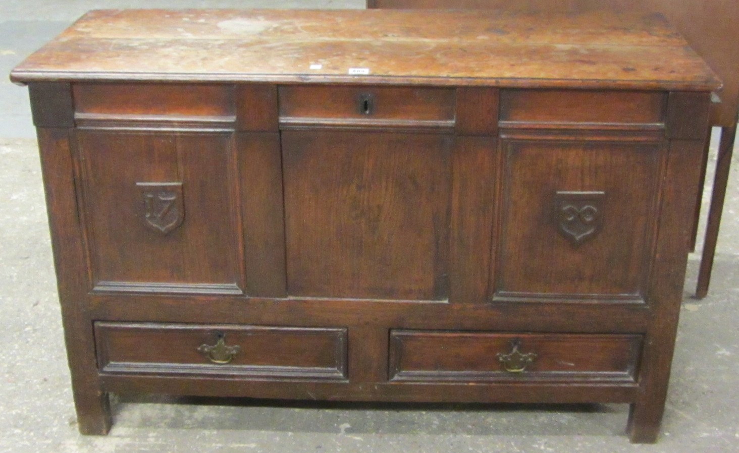 Appraisal: An early th century oak mule chest with triple panel