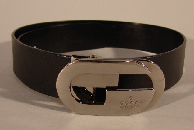 Appraisal: The enitre black leather belt measuers with the first adjustment