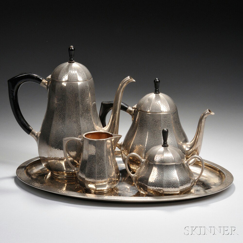 Appraisal: Four-piece WMF Silver-plate Tea Service and Tray a coffeepot teapot