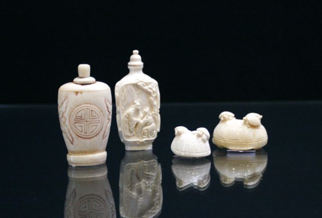 Appraisal: Three ivory snuff bottles together with two netsukes with turtle