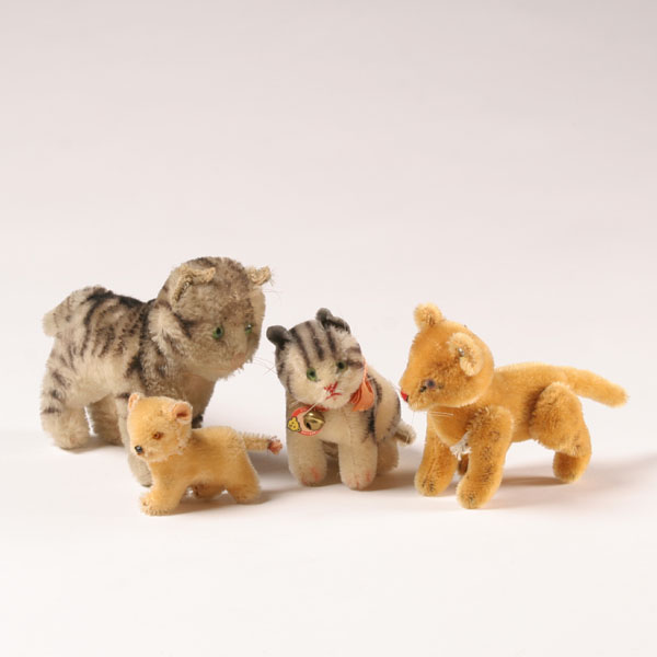 Appraisal: Steiff Susi cat leopard and lion cubs two with ear