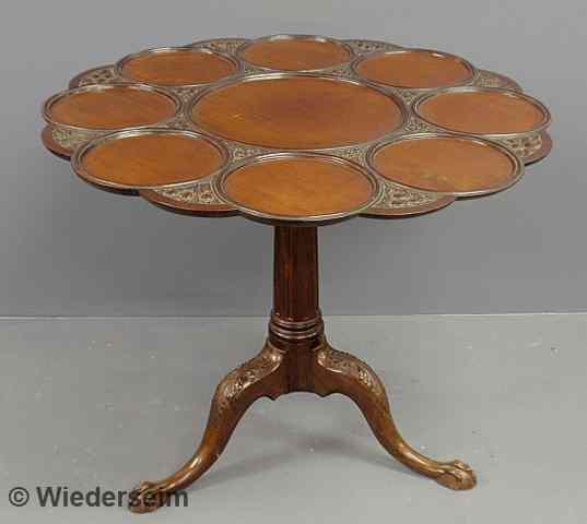 Appraisal: Georgian mahogany tea table c with circular carved top birdcage