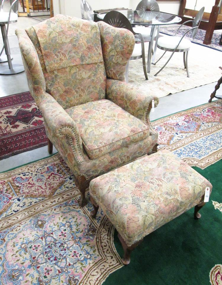 Appraisal: CHIPPENDALE STYLE WINGBACK ARMCHAIR WITH OTTOMAN American mid- th century