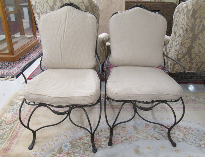 Appraisal: A SET OF EIGHT FORGED IRON PATIO ARMCHAIRS unknown maker