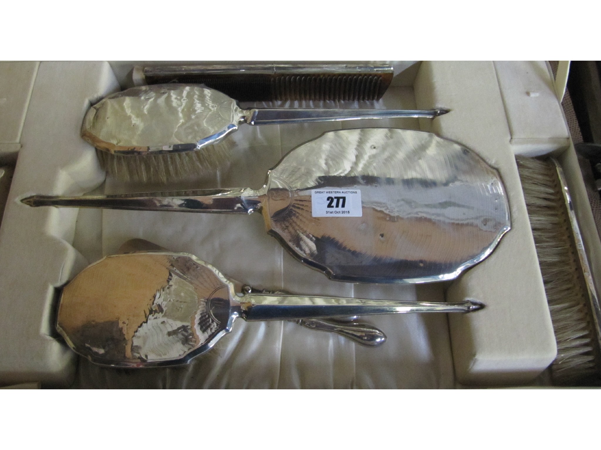 Appraisal: A cased six piece silver dressing table set Birmingham