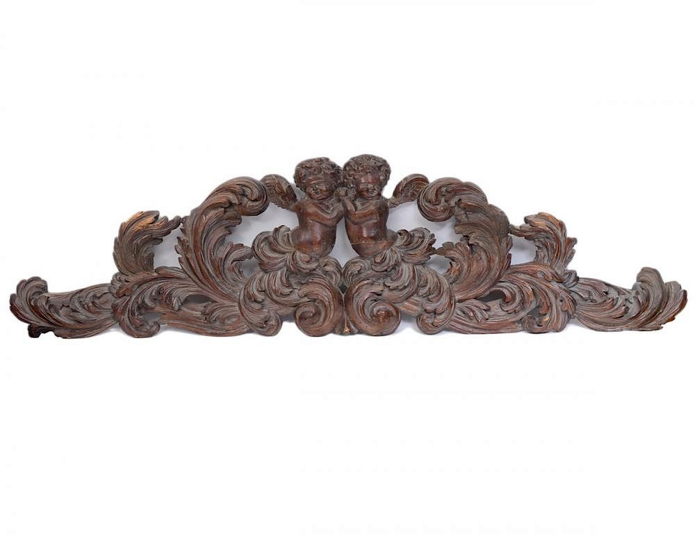 Appraisal: PUTTI LEAF CARVED WALNUT ARCHITECTURAL ELEMENT Probably Italian th Century