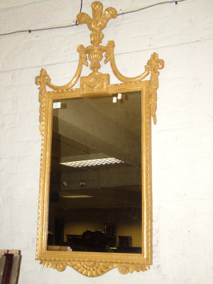 Appraisal: A Beaumont Fletcher giltwood wall mirror the pediment with Prince