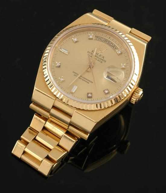 Appraisal: A Rolex Oyster Perpetual Day-Date gold wristwatch Quartz movement circular