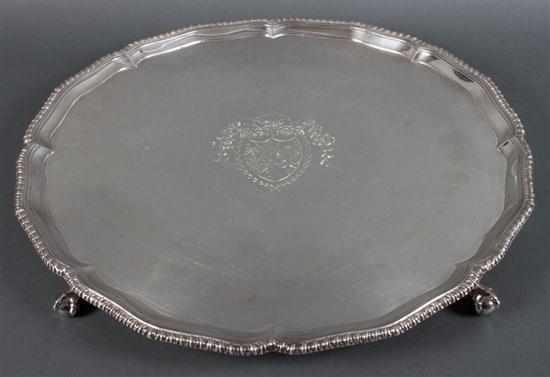 Appraisal: English Sheffield silver-plated copper footed salver with engraved armorial cartouche