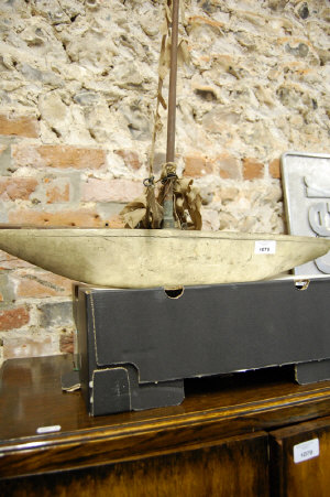 Appraisal: An early th century solid-hull pond yacht with sloop rigging