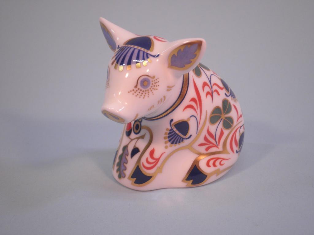 Appraisal: A Royal Crown Derby figure of a seated pig