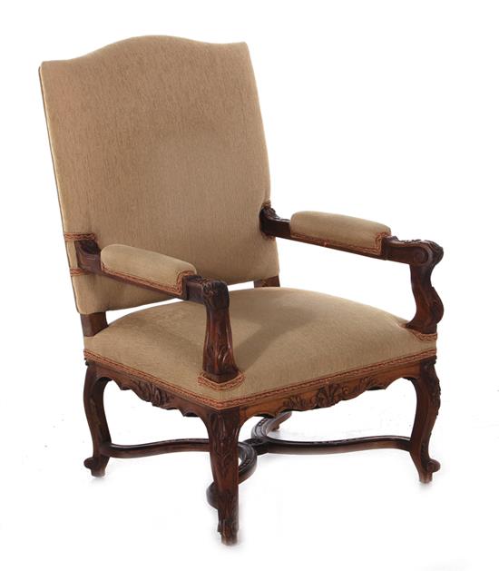 Appraisal: Continental Provincial carved walnut armchair BH SH W D Provenance