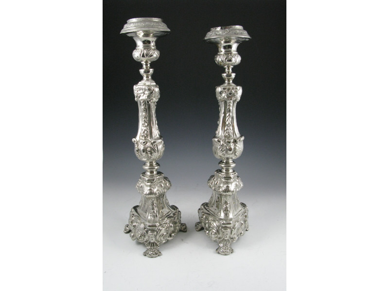 Appraisal: Pair of Tall Silverplate Candlesticks th c grand Baroque style