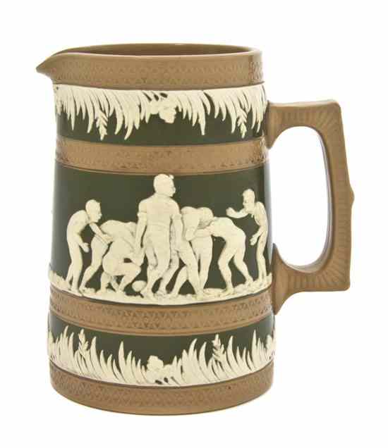 Appraisal: An English Jasperware Ewer decorated with a continual scene of