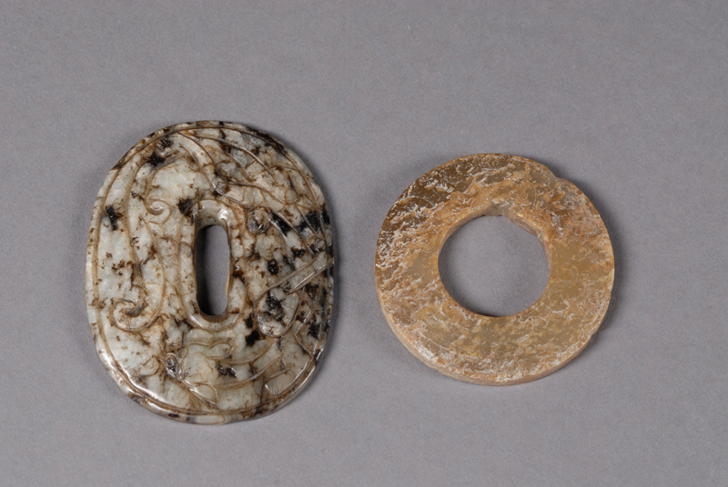 Appraisal: Two Archaic-style Jade Pi lg and in Provenance One from