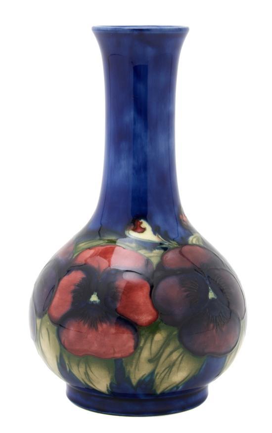 Appraisal: An English Pottery Vase Moorcroft decorated with pansies Height inches