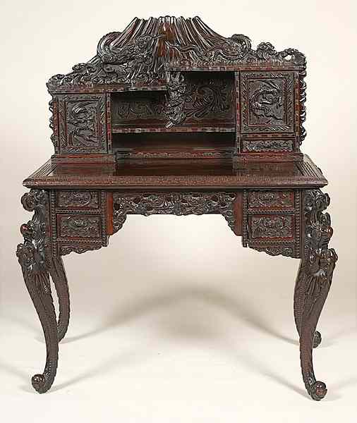 Appraisal: Chinese Carved Rosewood Desk Chinese th century A rosewood desk