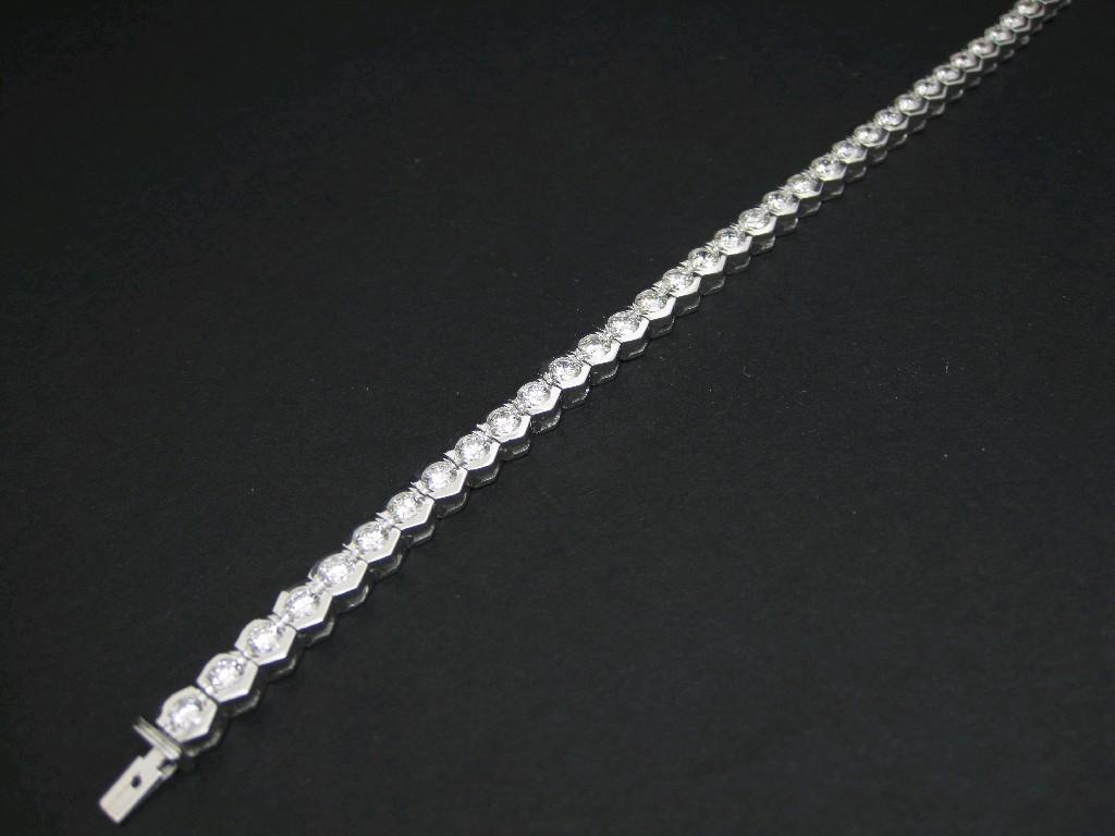 Appraisal: A Diamond Tennis Bracelet pav -set forty brilliant-cut stones estimated