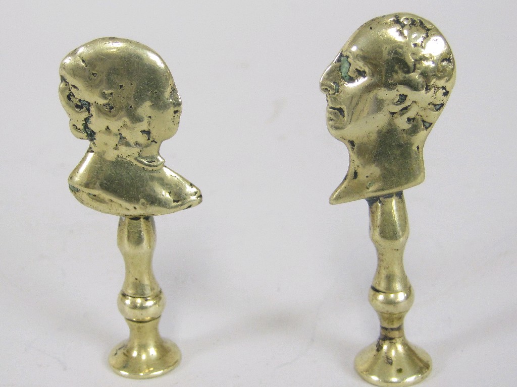 Appraisal: Pair of unusual Victorian brass Pipe Tampers in the form