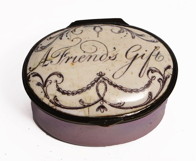 Appraisal: A GEORGE III OVAL ENAMEL PATCH BOX with purple ground