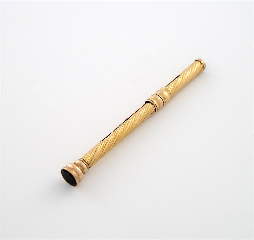 Appraisal: An early th century gold pencil holder