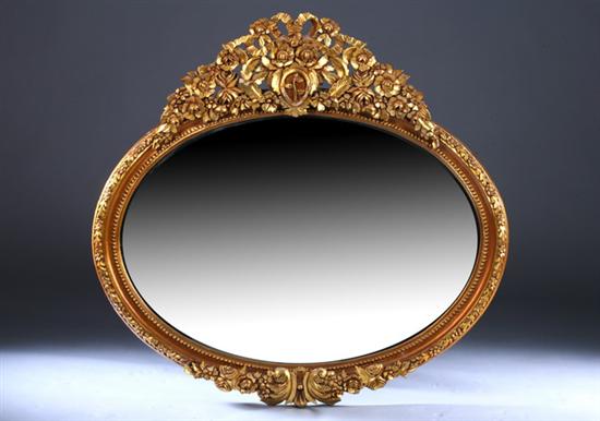 Appraisal: LOUIS XVI STYLE GILTWOOD OVAL WALL MIRROR late th century