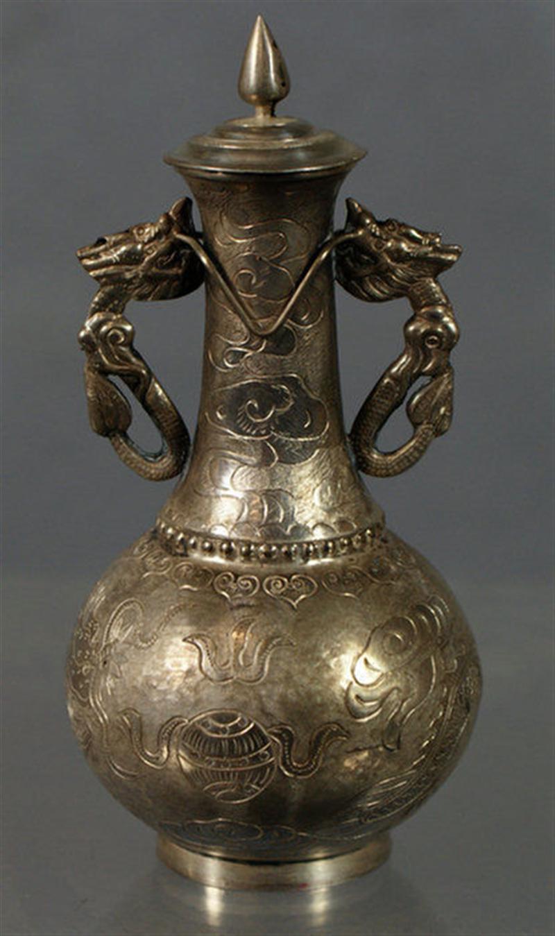 Appraisal: Chinese silver wine ewer engraved dragon design h th century