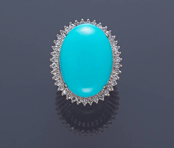 Appraisal: A turquoise and diamond ring mounted in eighteen karat white