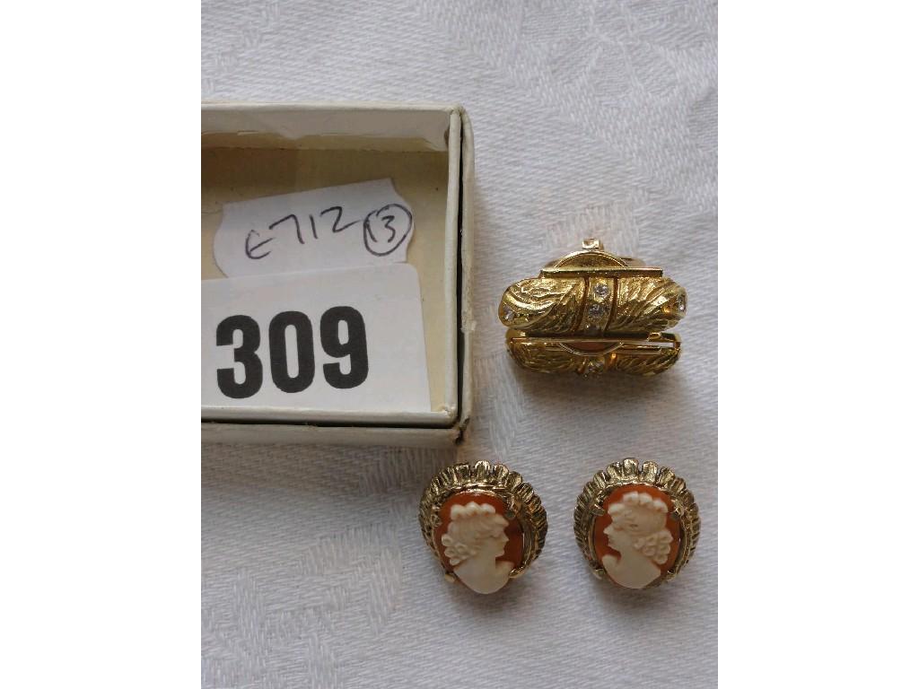 Appraisal: Two pairs of ladies earrings of stylised form one with