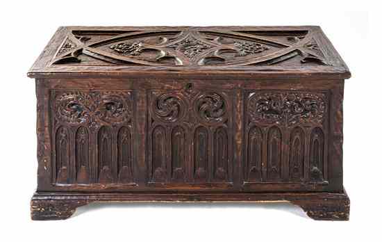 Appraisal: An English Oak Chest later carved by Charles S Hall