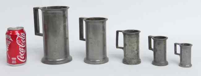 Appraisal: Set of five graduated th c pewter measures '' Ht