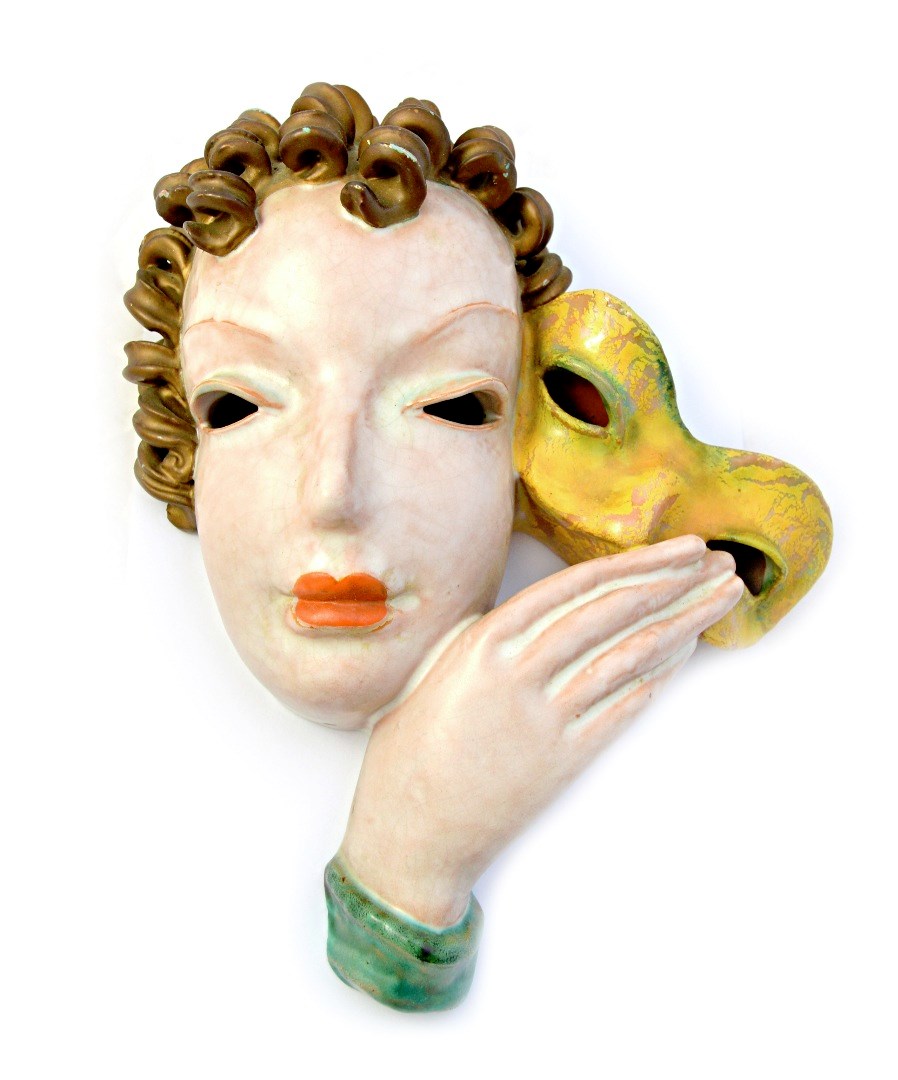 Appraisal: A Goldscheider pottery wall mask 's depicting an Art Deco