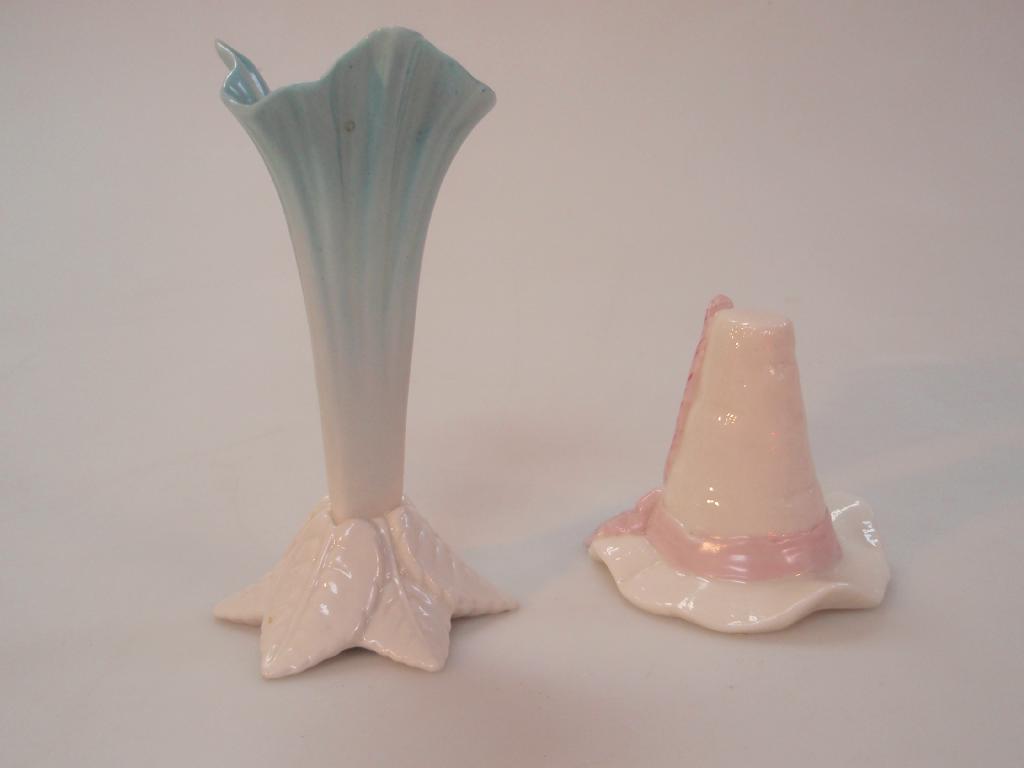 Appraisal: A Royal Worcester bud vase with a fluted blue tinted