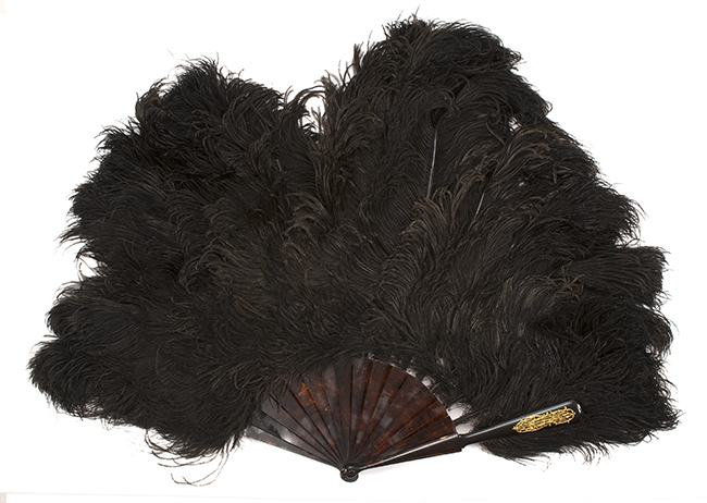 Appraisal: BLACK OSTRICH FEATHER AND SHELL FAN Circa Luxurious black ostrich