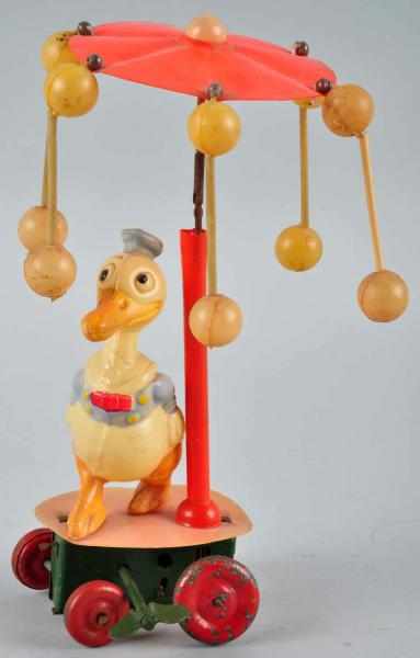 Appraisal: Celluloid Donald Duck Whirligig Wind-Up Toy Description Japanese Working Base