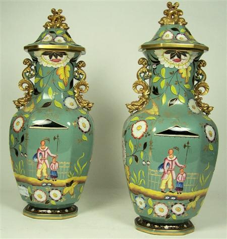 Appraisal: A pair of th century Ironstone vases and covers each