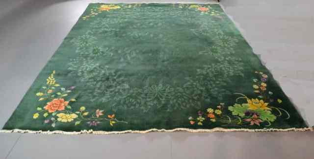 Appraisal: CHINESE AREA RUGVery nice hand-knotted Chinese rug with colorful corner