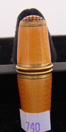 Appraisal: Orange enamel mending tube