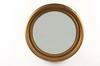 Appraisal: s BULL'S-EYE MIRROR - Gold painted molded Arts Crafts style