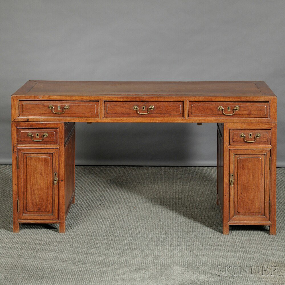 Appraisal: Partners Desk China hardwood two-pedestal desk with drawers x x