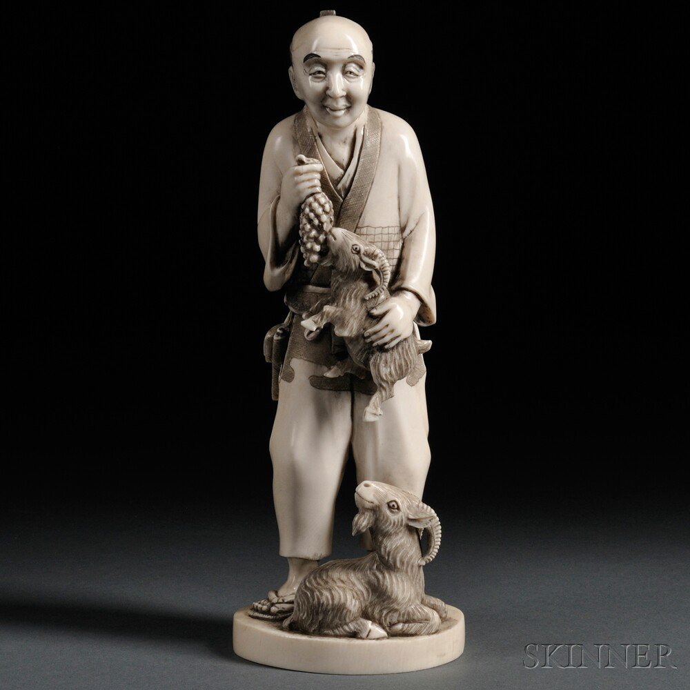 Appraisal: Ivory Okimono of a Man with Rams Japan th th